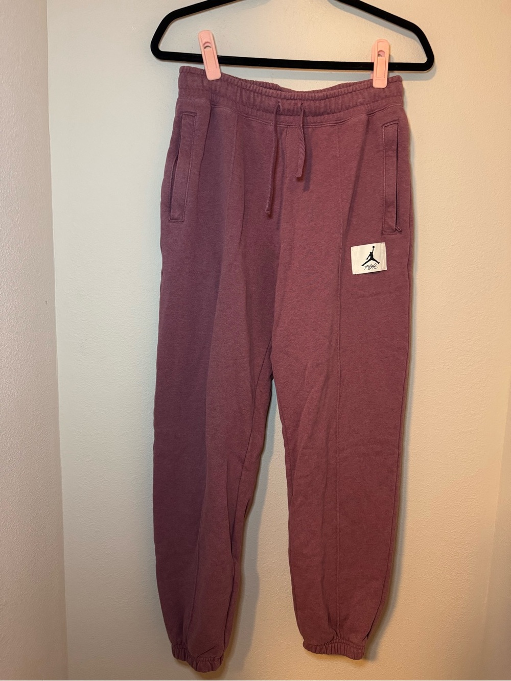 Jordan Women's Essentials Fleece Jogger Pants in a mauve - Picture 3 of 7